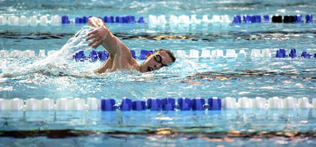 Swimmer in Six Finals