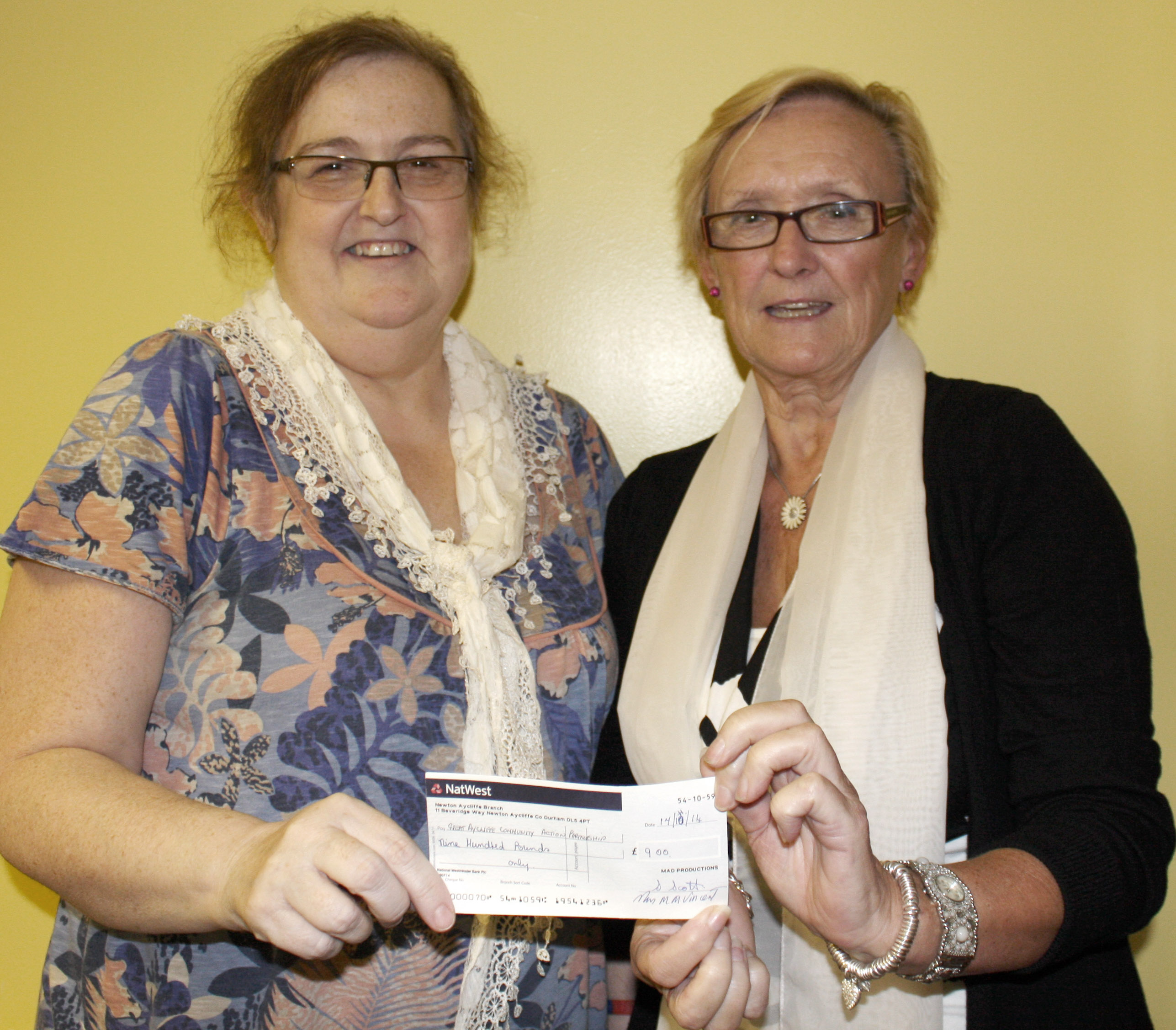 MAD Choir Donates £900 to GACAP Charity