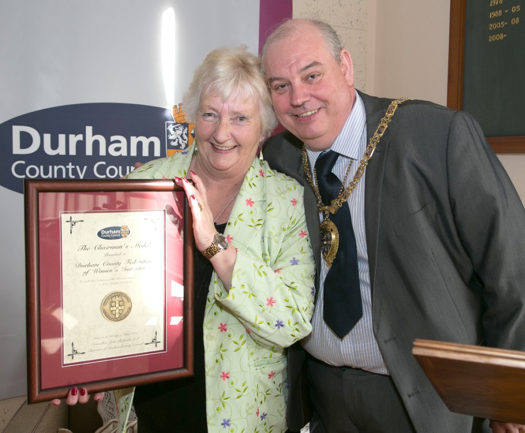 Lyn Swift chairman Durham County WI is prented with the Chairmans Medal  by Coun John Robinson Chairman of Durham County Council. Picture: Keith Taylor