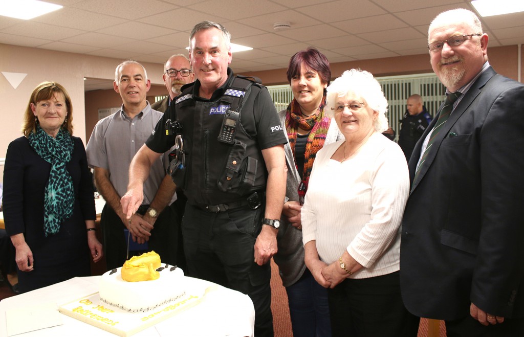 Alan Thompson cuts the cake