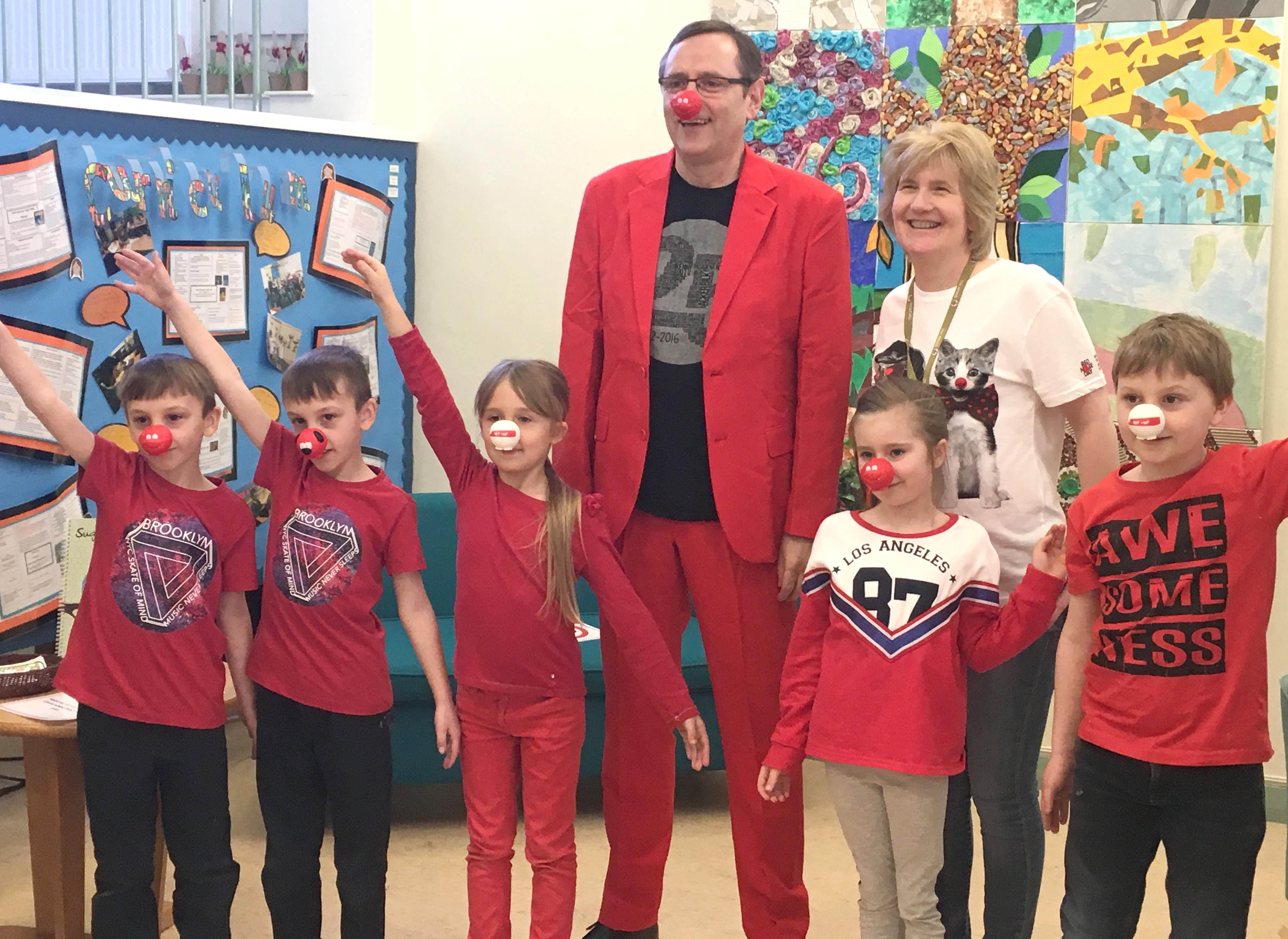 MP Phil Wears Red Suit & Nose for Comic Relief