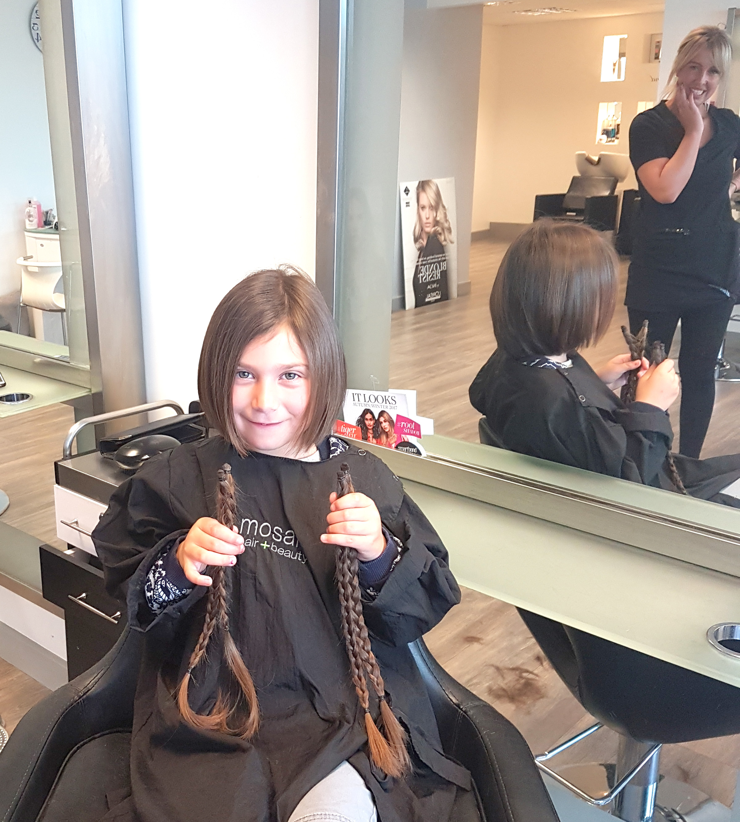 6 year old Donates Long Plaits to Charity