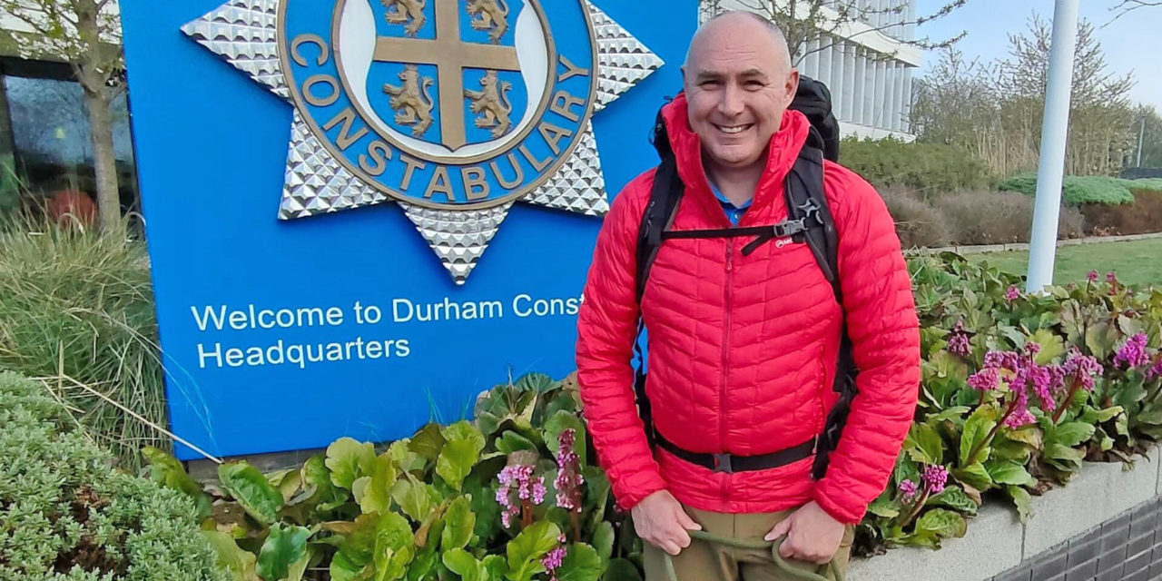 Senior police officer marks retirement by hiking 84 miles for charity