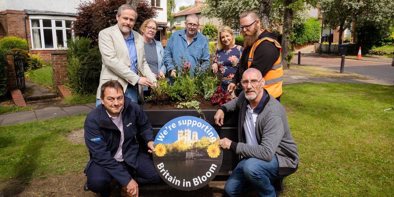 Teams help to make community bloom with new planters