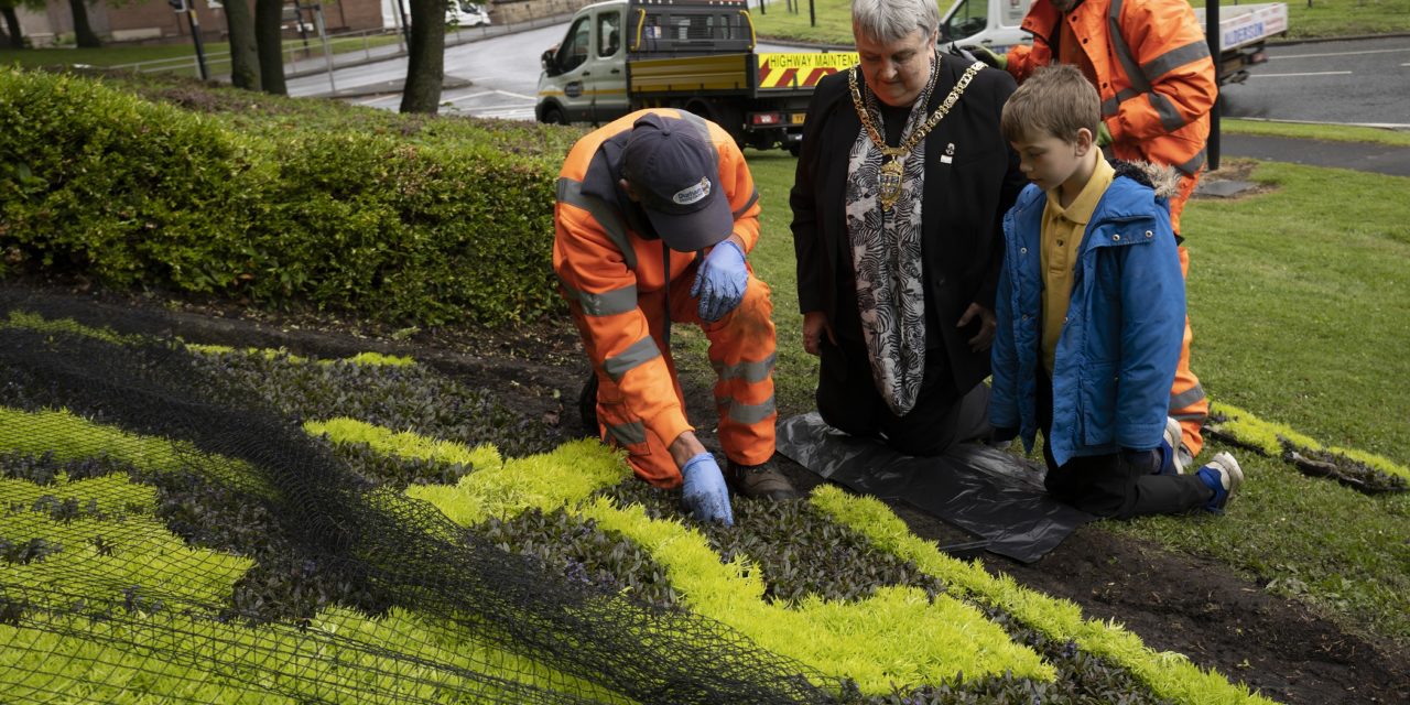 Pupils help plant annual flower display