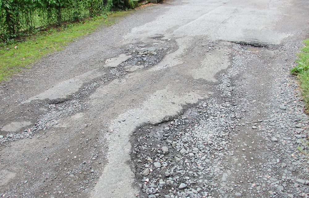 Who to contact about potholes?